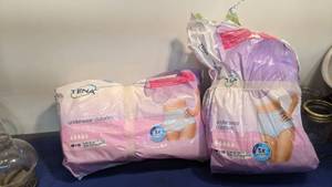 lot 1577 image: Tena underwear size small medium fits 29 to 40 in package been open