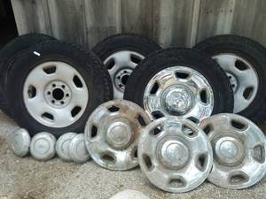 lot 2071 image: one set 17 inch tires and wheels and two sets of hubcaps off of 2005 f150
