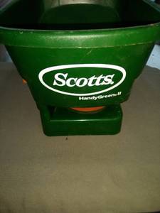 lot 2074 image: new Scotts handy green hand spreader