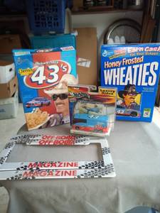 lot 2083 image: Petty cereal boxes and motorcoach with off-road magazine plate covers