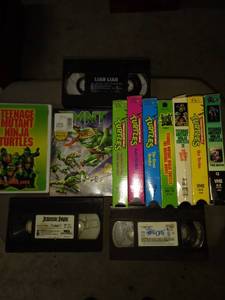 lot 2109 image: teenage mutant Ninja turtles VHS collection two DVDs and three various VHS tapes