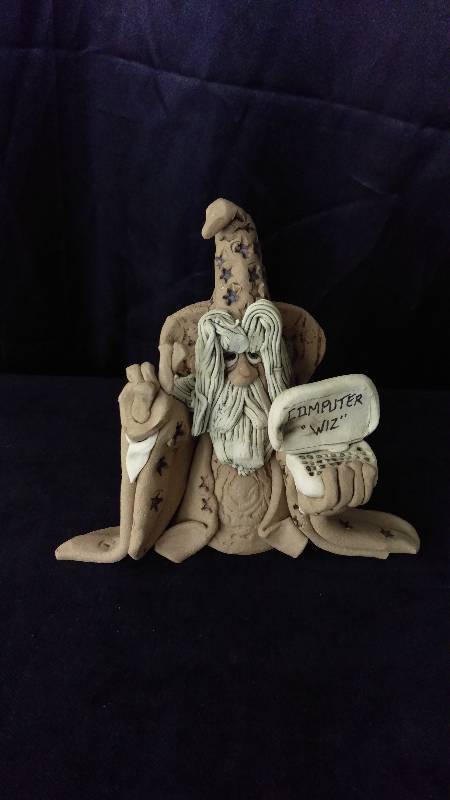 lot 76 image: Computer Wiz Figurine