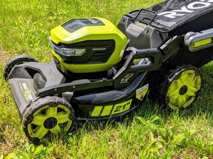 lot 1005 image: RYOBI 21 in. 40-Volt Brushless Lithium-Ion Cordless SMART TREK Self-Propelled Walk Behind Mower with 6.0Ah Battery and Charger -- MSRP $599