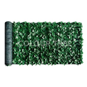 lot 1059 image: COLOURTREE 59 in. x 198 in. Faux Ivy Leaf Vines IndoorOutdoor Privacy Fencing Roll -- MSRP $139.99