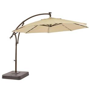 lot 1007 image: Hampton Bay 11 ft. LED Round Offset Outdoor Patio Umbrella in Putty Tan -- MSRP $499 -- LOT UPDATED - COLOR CHANGE