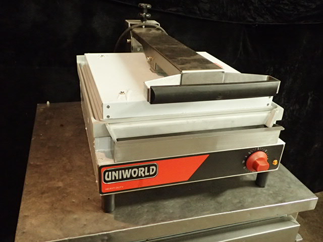 lot 3565 image: Uni World Countertop Patti Press