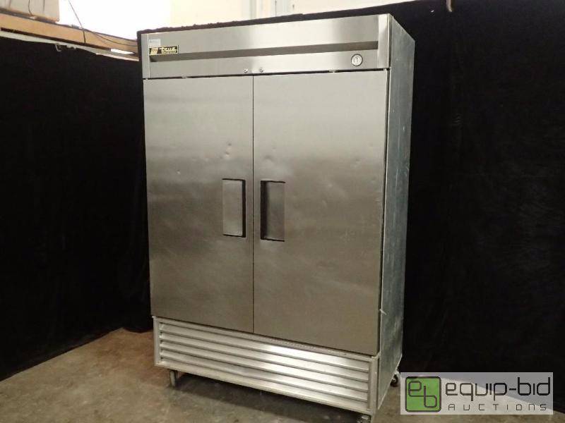 lot 3006 image: True 55 Solid Door Reach-In Refrigerator (T-49)