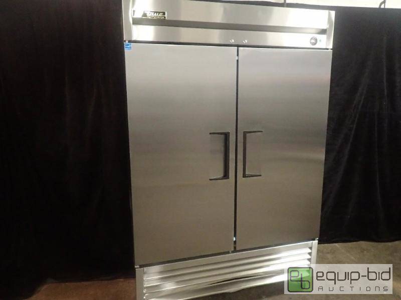 lot 3007 image: True 55 Solid Door Reach-In Refrigerator (T-49)