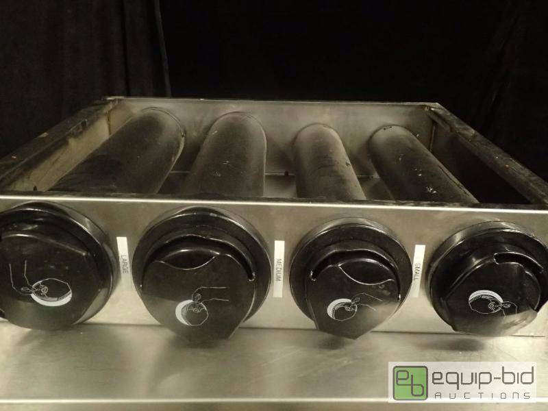 lot 1143 image: Four Size Lid Dispenser
