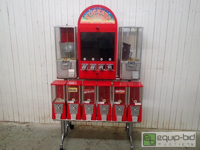 lot 1042 image: 2 Tier Rolling Vending Machine and Sticker Machine