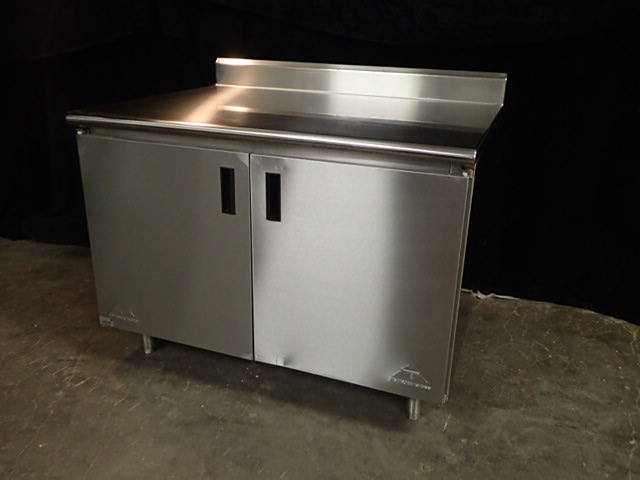 lot 3799 image: Advance Tabco 14 Gauge Enclosed Base Stainless Steel Work Table with Fixed Mid Shelf and 5 Backsplash