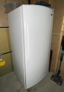 lot 9743 image: &nbspWhirlpool Upright Freezer - Works Great Frost Free - M# EV180NZTQ 01 - contents not included