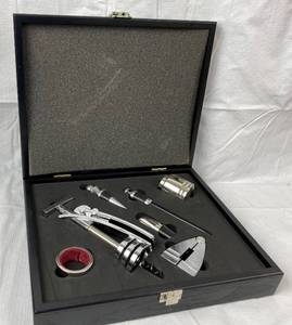 lot 9775 image: Elegant Wine Set - Openers, Stoppers, Pouring Aerator and more All in a beautiful gift box - Like new