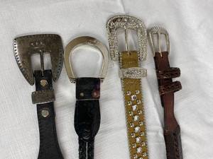 lot 9853 image: Lot of 4 Designer Belts - various sizes - fits a size Medium
