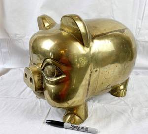 lot 9640 image: Large Brass Pig Piggy Bank w stopper - Almost a foot tall Over a foot long w stopper and coins inside This thing is HUGE and HEAVY