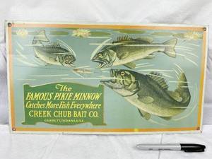 lot 9673 image: Metal Embossed Creek Chub Bait Co. Sign - 16.5 x 9.5