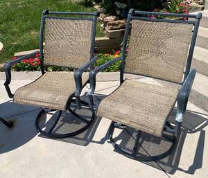 lot 9709 image: Pair of Swivel Patio Chairs - Solid Metal Frames, Heavy - Nice Fabric, no holes, rips or tears - see pics