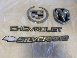lot 3354 image: Lot of Car Emblems, Cadillac, Dodge, Chevy and More