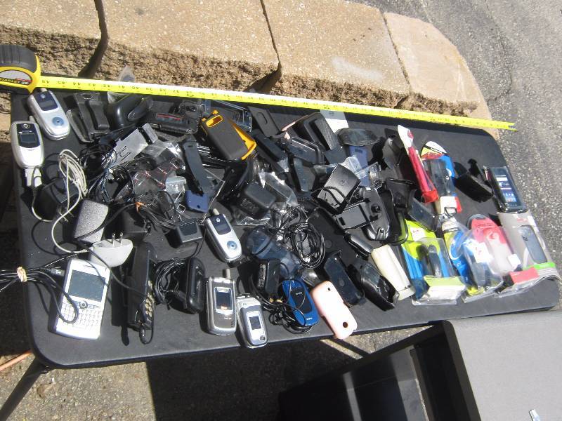 lot 7058 image: Cell phone lot (9) cell phones with chargers, 45 misc. style cases