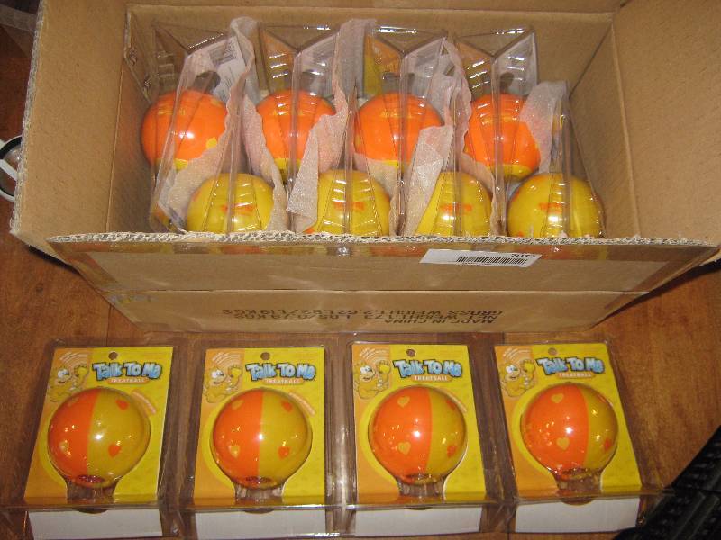 lot 7074 image: 1 dozen Talk to Me Pet Products Talk to Me Treat holder ball for cats, Orange and Yellow