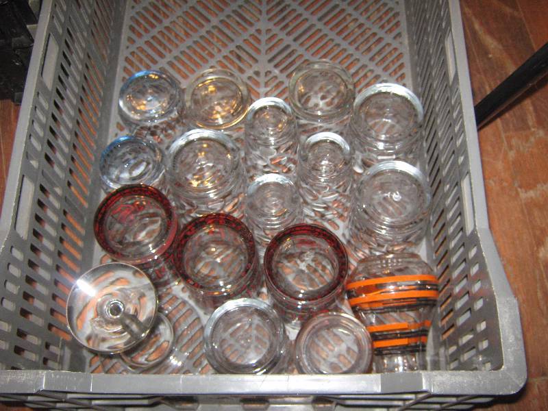 lot 7101 image: Lot of glass tumblers, glasses and juice carafe, assorted sizes, styles and colors