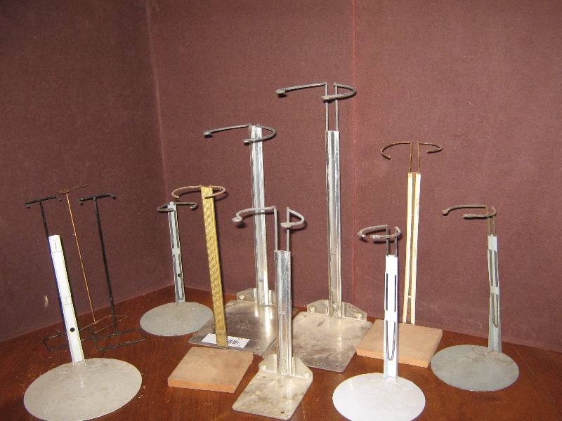 lot 7112 image: 11 ct lot of doll stands, metal various heights, adjustable