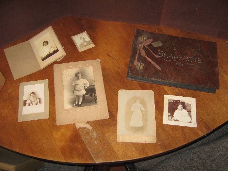 lot 7164 image: Wooden Cover Snapshots Photo Album (empty) and old photos