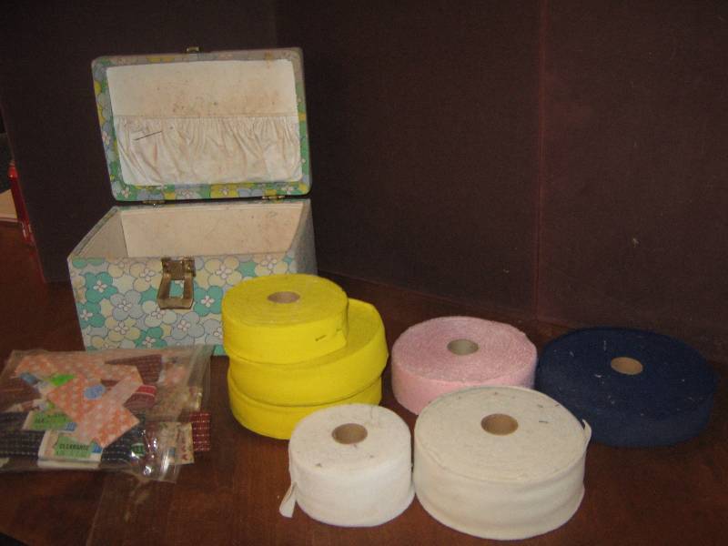 lot 7170 image: Sewing lot- sewing box, 7 rolls of colored elastic, (1) bag of ribbon remnents