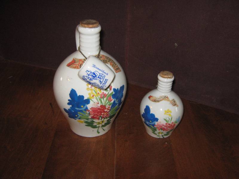 lot 7175 image: 3 ct. lot  Stoneware German Liquor jugs, (1) large, (2) small