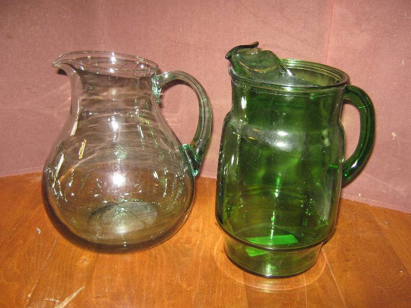 lot 7176 image: 2 ct lot Glass pitchers- green glass, different styles