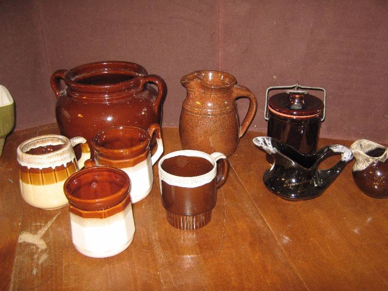lot 7186 image: 9 ct. lot stoneware and ceramic mugs, pitcher, pot and crock