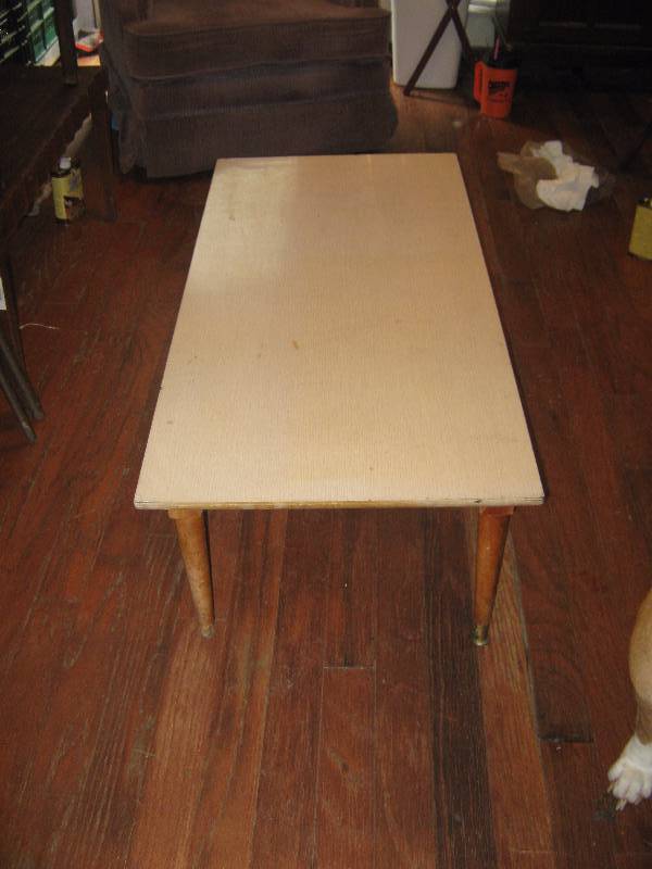 lot 7218 image: Coffee Table, wooden base, Formica top 42 x 20 x 16 tall