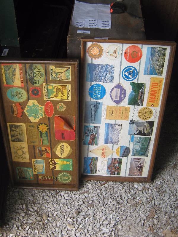 lot 7231 image: 2 ct. lot travel tags mounted to paneling w wooden frames