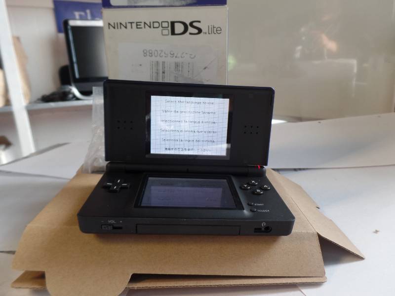 lot 1028 image: NINTENDO ND LITE BLUE NEW IN THE BOX