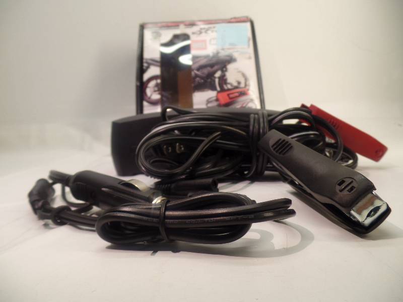 lot 1054 image: BATTERY EXTENDER ACCESSORIES INCLUDED