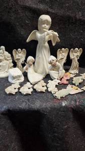 lot 1582 image: Large Angel Bisqueware Lot