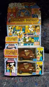 lot 1642 image: Pair of Hallmark Road Rovers Chocolate Factory Cars