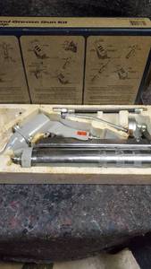 lot 1856 image: Multipiece Grease Gun