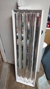 lot 1879 image: New 4 Bulb Flourescent Light Fixture With Motion Control Sensor