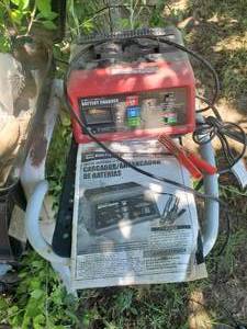 lot 3843 image: Centech battery charger