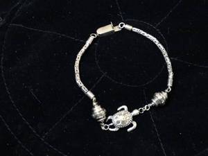 lot 37210 image: Sterling Silver Bracelet with Turtle Bead, Ornate Crafting & Strong Clasp Closure