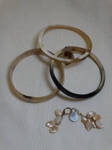 lot 37211 image: 3 Bracelets from Ghana and Mother of Pearl Earrings