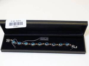 lot 37301 image: Sterling Silver & Teal Blue Gemstone Bracelet