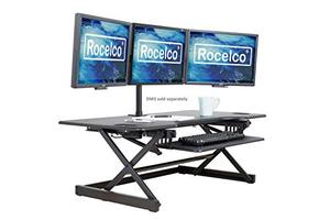 lot 12467 image: Rocelco 46 Large Height Adjustable Standing Desk Converter, Quick Sit Standup Triple Monitor Riser, Gas Spring Assist Computer Workstation, Retractable Keyboard Tray, (R DADRB-46), Black
