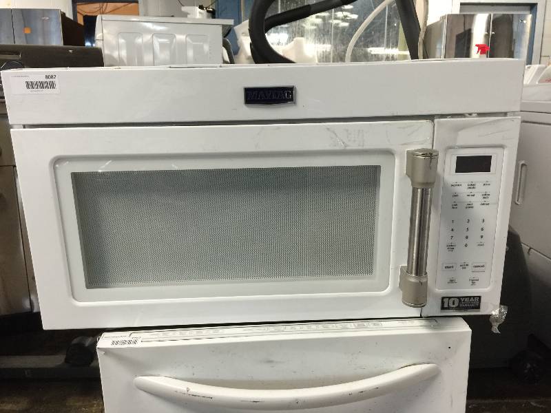lot 8087 image: APPEARS TO BE NEW  MAYTAG 2.0 cu. ft. Over-the-Range Microwave With Hidden Vent