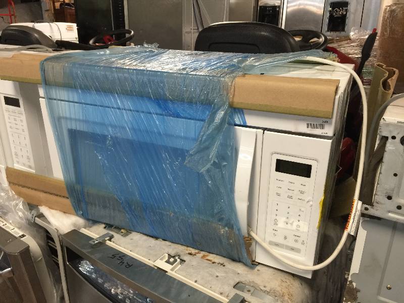 lot 535 image: 1.7 cu. ft. Over the Range Microwave with Hidden Vent