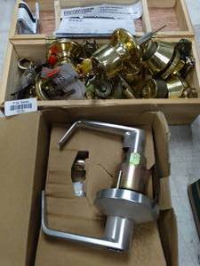 lot 37151 image: Door Hardware Lot - Many Doorknobs along with one heavy duty door handle assembly