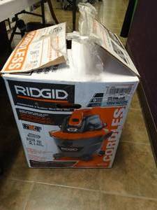 lot 37033 image: 9 Gallon Ridgid Cordless Wet  Dry Vac
