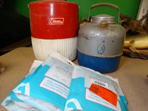lot 37184 image: Two Vintage Coolers with Water Cooler Cleaning Kits