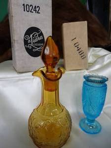lot 37190 image: Tiara Glass Vintage Amber Glass Bottle with Stopper & Small Blue Glass Vase - With Original Boxes